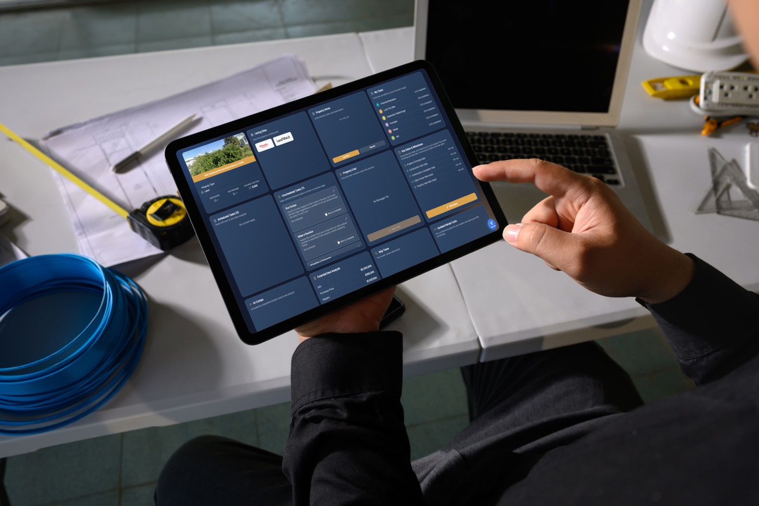Real estate investor reviewing rehab budget spreadsheet